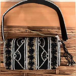 Fully beaded black gold white pattern handbag. Bead quality is beautiful. NWT